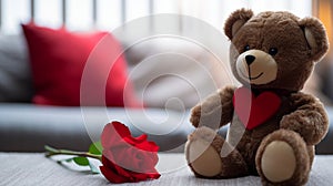 A close-up photograph where a lovable brown teddy bear takes center stage against a romantically blurred living room setting.