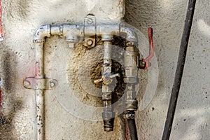 Close-up photography of a rustic pressurized air connection system photo