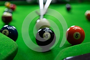 Close-up photos, playing billiard balls, various numbers, stabbing the ball, numbers and green ground