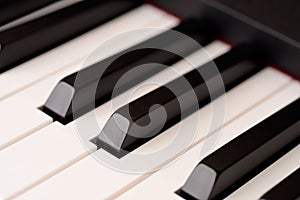 Close-up piano keyboard with shallow depth of field