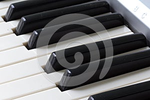 Close-up of piano keys. close frontal view.