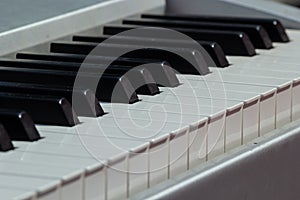 close-up of piano keys. close frontal view, black and white piano keys, viewed from above