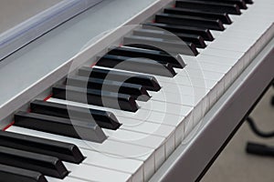 close-up of piano keys. close frontal view, black and white piano keys, viewed from above