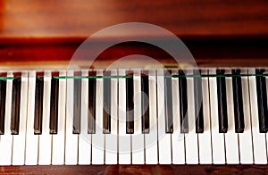 Close-up, piano keys, top view, flat lay. Background, cover for poster or banner