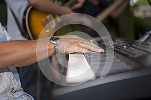 Close up of piano player`s hands