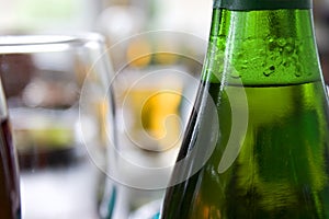 Close up picture of bottle of beer and glass