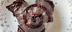 Close up picture of crackled top of double chocolate brownies