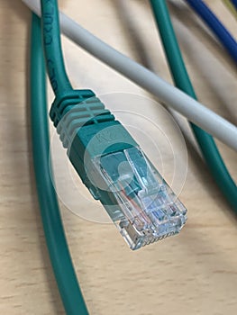 Close up picture of a green Network cable