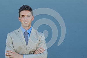 Close up picture of a handsome young elegant business man smiling to the camera