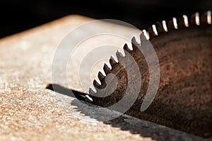 Close-up picture of a rusty circular saw in an old sawmill