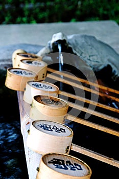 Close up picture of some Bamboo ladles at Izanagi Shrine, Japan