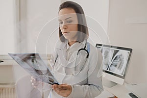 Close up picture of young woman radiologist