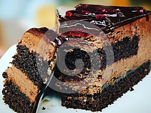 Close up piece of cake with chocolate photo