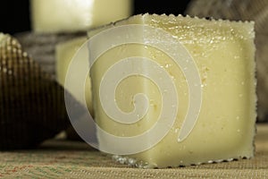 Close-up a piece of Manchego Curado cheese photo