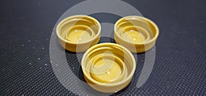 Close up 3 pieces of brown bottle cups