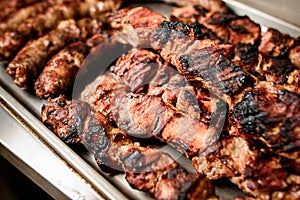 Close-up pieces of roast beef with crust