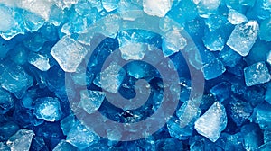 A close up of a pile of blue ice cubes
