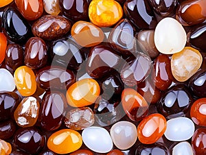 A close up of a pile of different colored stones