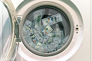 Close-up Of Pile Of Dirty Money Placed In Washing Machine