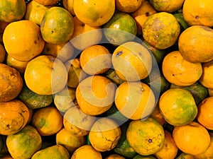 Close up of pile of fresh oranges