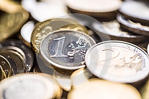 Close-up a pile of new euro coins in other compositions