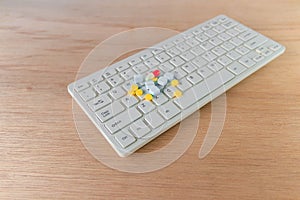 Close up pills and capsule on computer keyboard white Concept with copy space