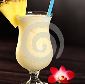 Close up of pina colada drink over black background created using generative ai technology