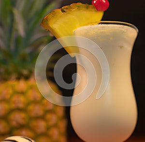 Close up of pina colada drink over pineapple created using generative ai technology