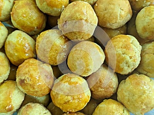 A close up of Pineapple tart, kue nastar, kueh tae and kuih tat nanas. pastries that are usually served during Eid in Indonesia