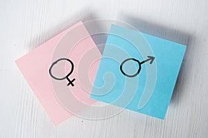Stickers with gender symbols Venus and Mars indicate man and woman on white background. Heterosexuality photo