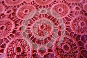 Close-up of pink broderie anglaise lace photo