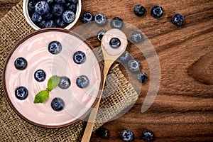 close up pink creamy homemade blueberries fruit yogurt with fre