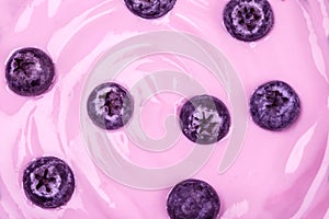 close up the pink creamy homemade blueberries fruit yogurt texture background