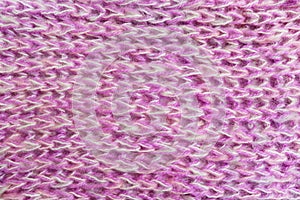 Close up of pink knitted wool texture