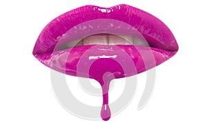 Close-up of pink lipgloss dripping from woman's lips over white background