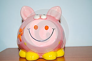 Close up of pink piggy bank - savings concept