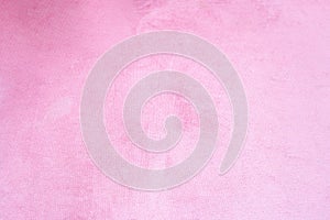 Close up of pink velvet fabric background texture, soft pastel pink textile