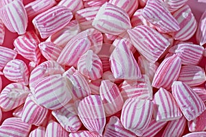 Close up of pink and white candy with selective focus