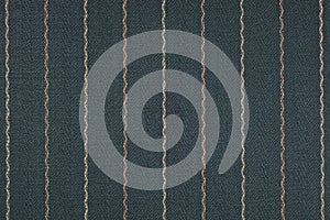 Close up of pinstriped fabric texture background.