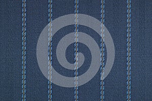 Close up of pinstriped fabric texture background.