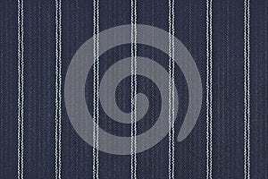 Close up of pinstriped fabric texture background.