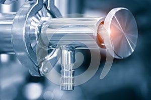 Close-up of a pipeline with a valve in a chemical industry or laboratory for industrial use