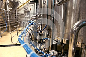 Close up of pipes and brewing kettles at beet factory