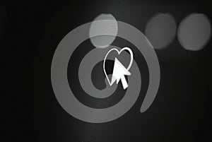 Close-up of a pixel cursor on a heart Ã¢â¬' digital affection