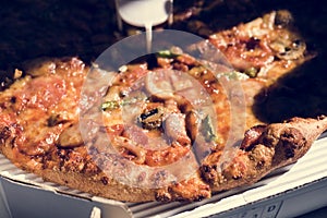 Close up of pizza in the box