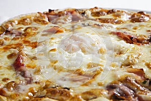 Close up of pizza with egg