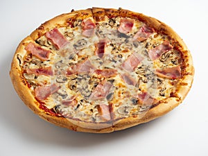 Close-up pizza with ham and mushrooms on a white background. A traditional Italian dish. A delicious and unhealthy dish. Top view