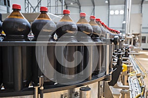 Close up of plastic bottle industry on a conveyor belt