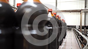 Close up of plastic bottle industry on a conveyor belt