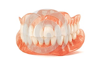 Close-up of plastic denture teeth isolate no fond background. Ne